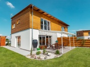 Hogyan rögzítsünk pergolát a szigetelt homlokzathoz?